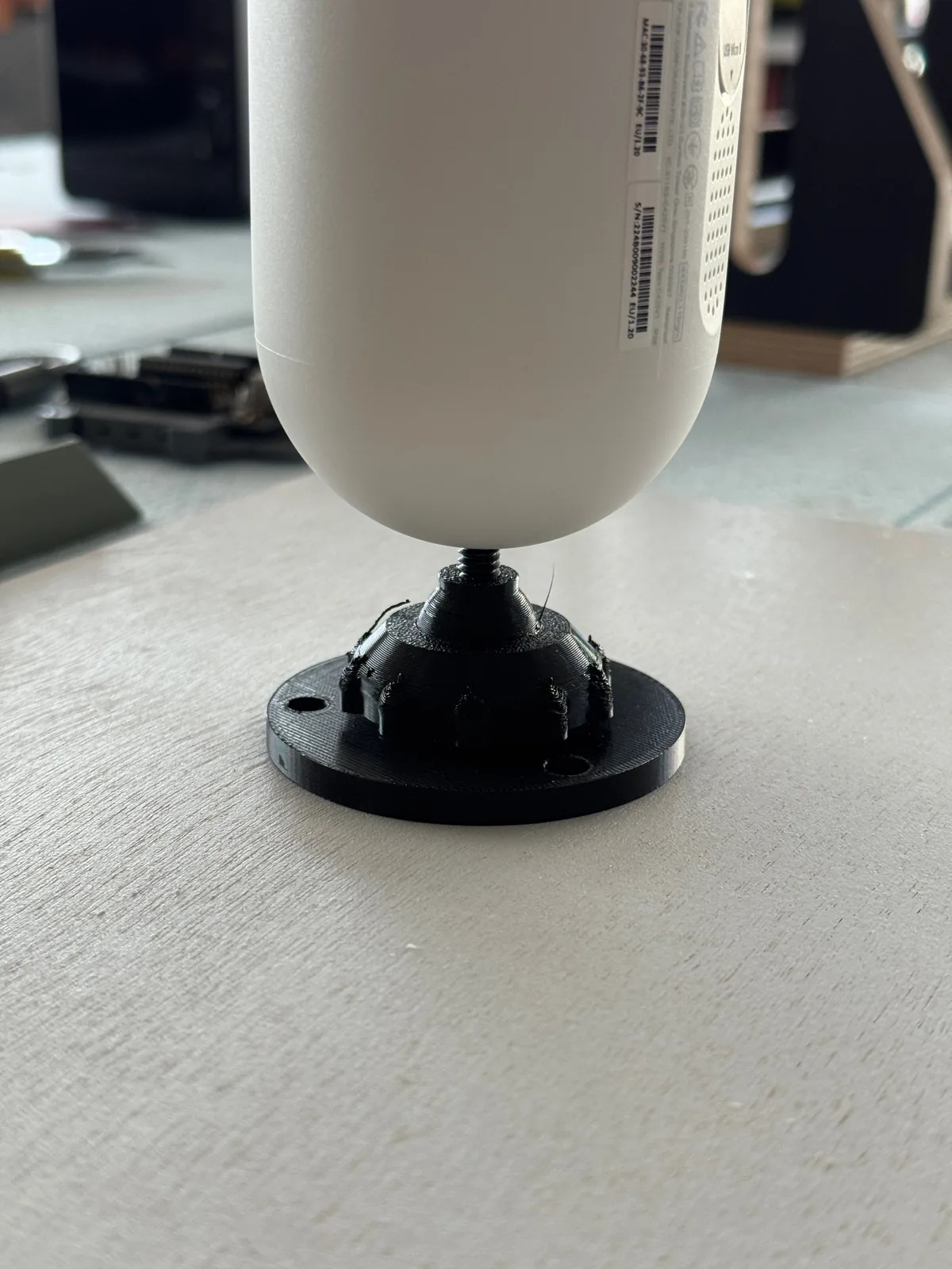 Outdoor security camera fitted on a custom 3D printed wall-mount adapter
