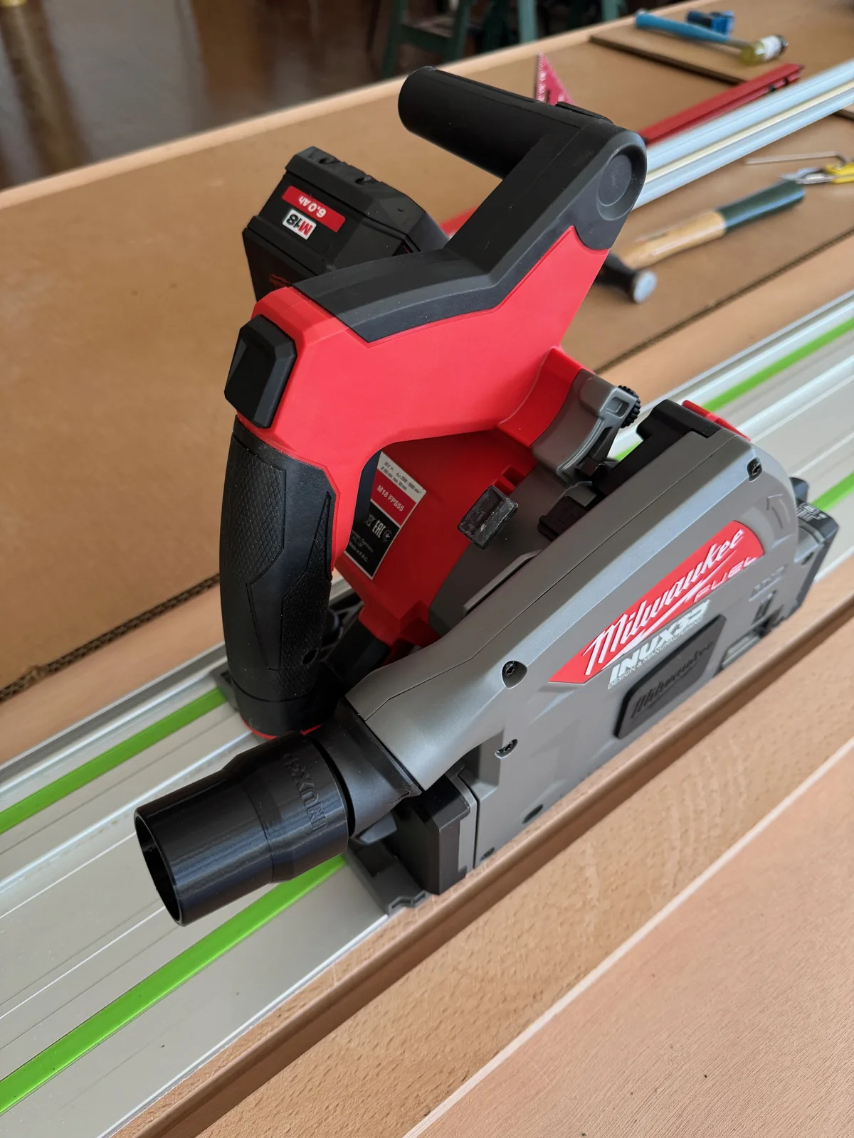 Custom 3D printed dust extraction adapter fitted to a Milwaukee M18 cordless track saw